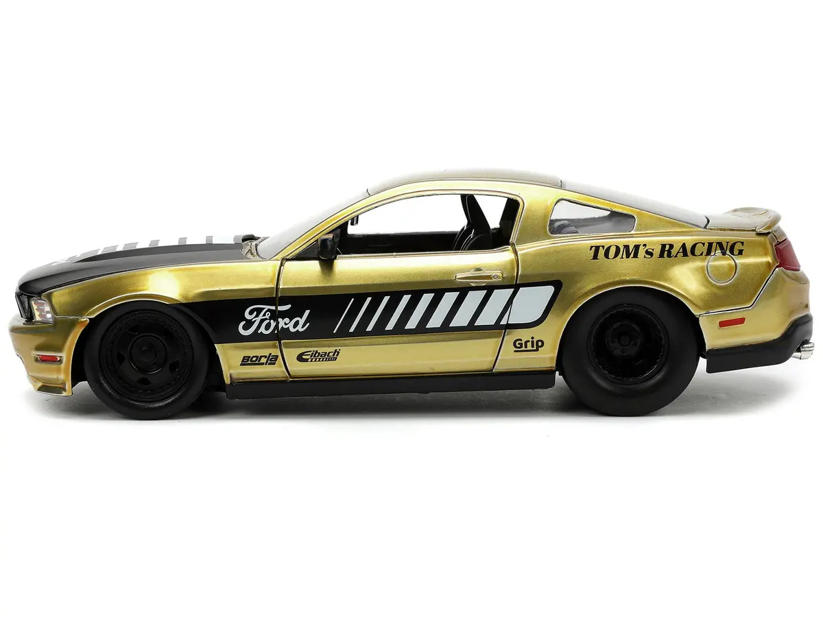 2010 Ford Mustang Gt Gold Metallic With Black Graphics And Hood "Tom's Racing" "Bigtime Muscle" Series 1/24 Diecast Model Car By Jada 2