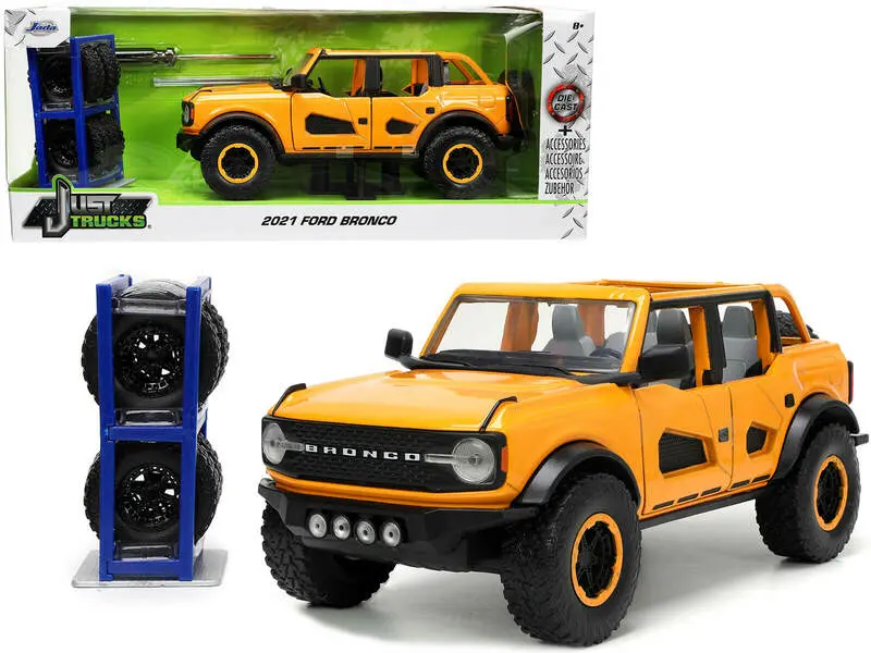 2021 Ford Bronco Orange Metallic With Extra Wheels "Just Trucks" Series 1/24 Diecast Model By Jada 1