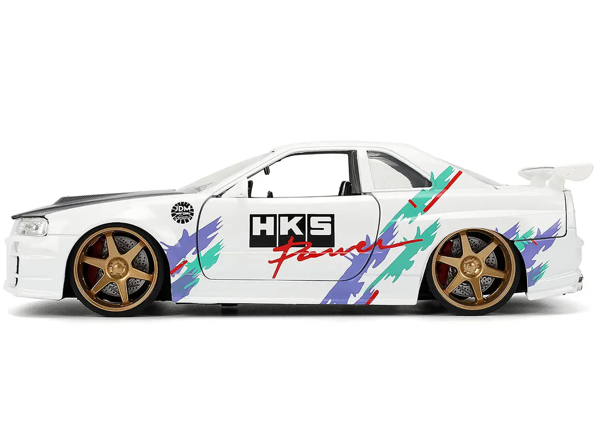 2002 Nissan Skyline Gt-R (R34) Rhd (Right Hand Drive) "Hks Power" White With Carbon Hood And Graphics "Jdm Tuners" Series 1/24 Diecast Model Car By Jada 2