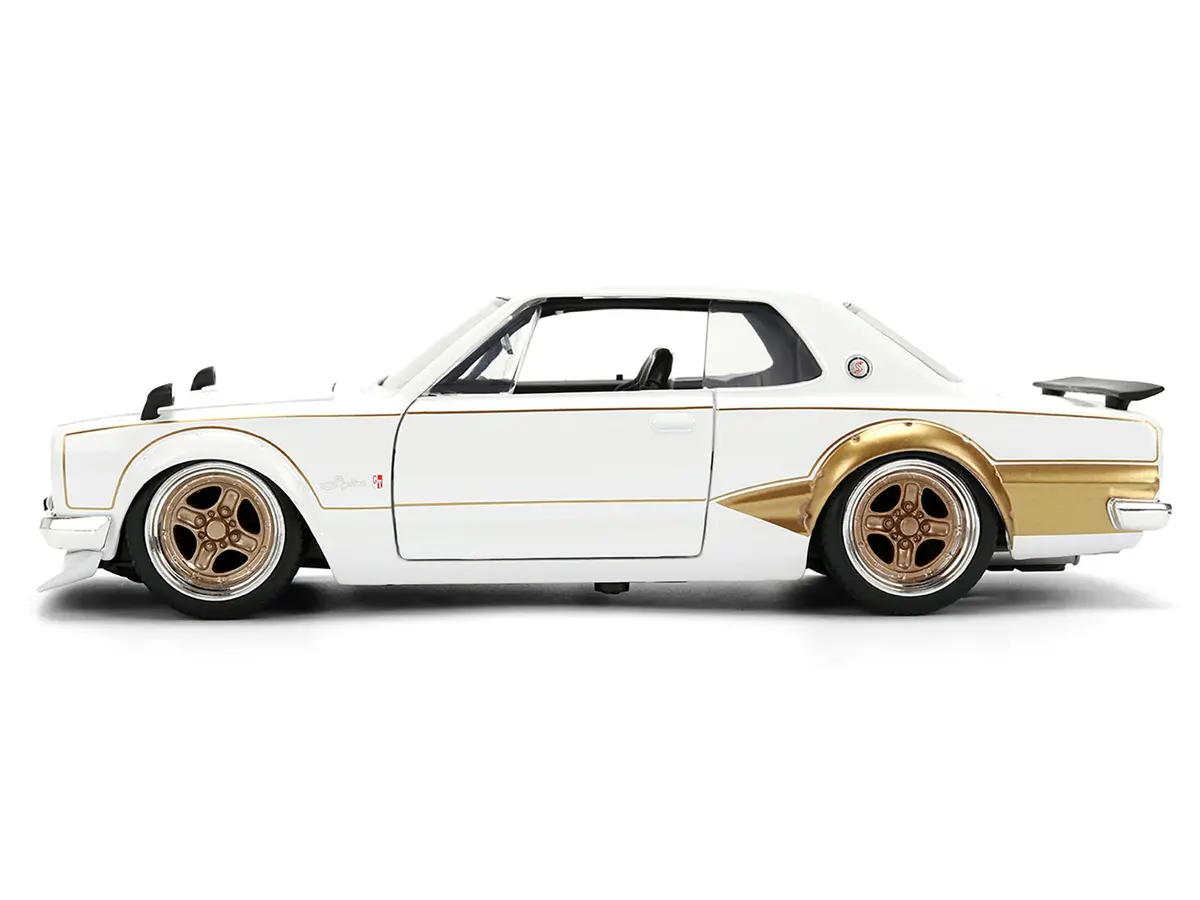 1971 Nissan Skyline 2000Gt-R Rhd (Right Hand Drive) White With Gold Graphics "Jdm Tuners" Series 1/24 Diecast Model Car By Jada 2